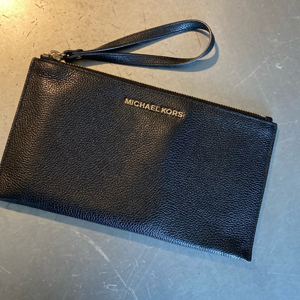 Michael Kors slim clutch. Leather